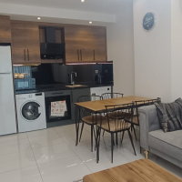 Меблированная 1+1 рядом с морем и полным отельным сервисом в центре Махмутлара