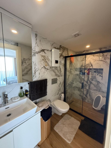 Просторная 2+1 с мебелью и бассейном в центре Аланьи — для жизни и ВНЖ