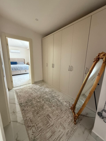 Просторная 2+1 с мебелью и бассейном в центре Аланьи — для жизни и ВНЖ