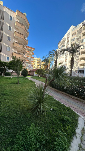 Уютная светлая квартира 2+1 у моря в тихом районе Тосмура — полностью меблирована и готова к жизни