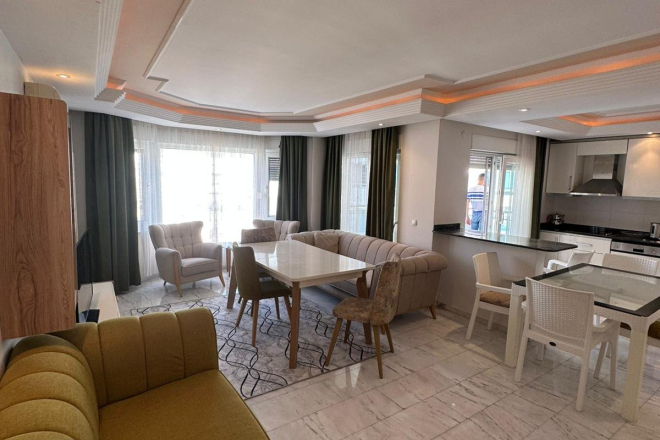 Просторная квартира 2+1 на первой линии моря в Тосмуре — готова для проживания и ВНЖ