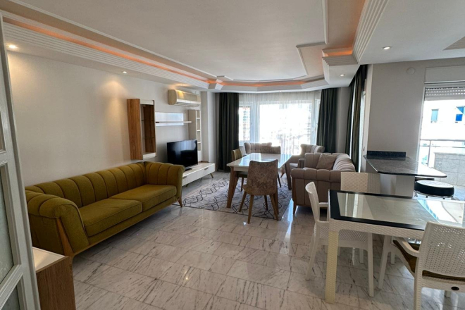 Просторная квартира 2+1 на первой линии моря в Тосмуре — готова для проживания и ВНЖ