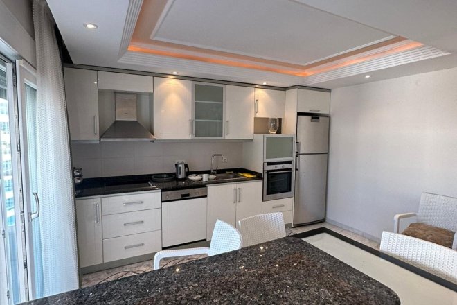 Просторная квартира 2+1 на первой линии моря в Тосмуре — готова для проживания и ВНЖ