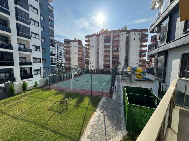 Просторная 1+1 в Махмутларе с курортной инфраструктурой и 500 м до моря