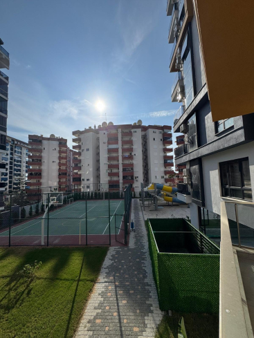 Просторная 1+1 в Махмутларе с курортной инфраструктурой и 500 м до моря