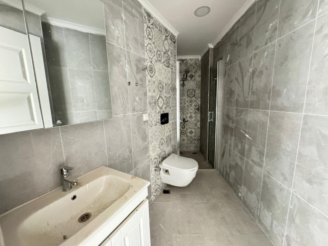 Просторная 1+1 в Махмутларе с курортной инфраструктурой и 500 м до моря