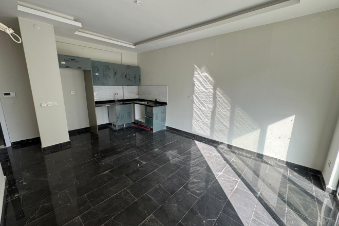 Просторная 1+1 в Махмутларе с курортной инфраструктурой и 500 м до моря