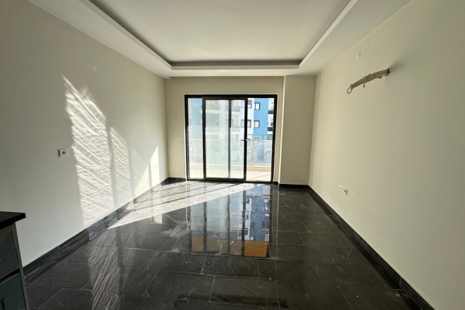 Просторная 1+1 в Махмутларе с курортной инфраструктурой и 500 м до моря