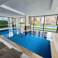 Просторная 1+1 в Махмутларе с курортной инфраструктурой и 500 м до моря