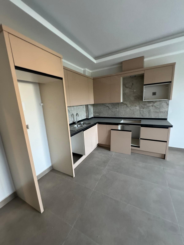 Новая 1+1 в Махмутларе с богатой инфраструктурой и шаговой доступностью к морю