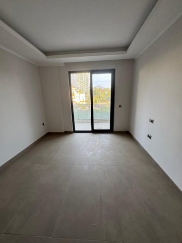 Новая 1+1 в Махмутларе с богатой инфраструктурой и шаговой доступностью к морю