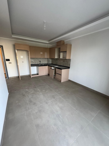 Новая 1+1 в Махмутларе с богатой инфраструктурой и шаговой доступностью к морю