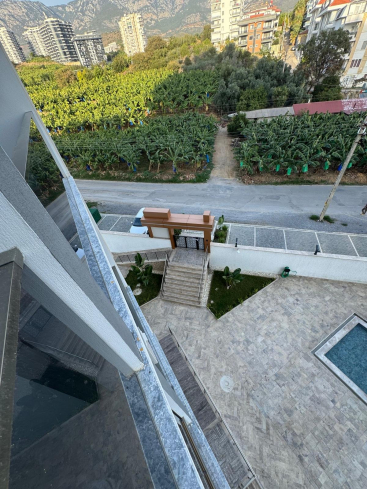 Новая 1+1 в Махмутларе с богатой инфраструктурой и шаговой доступностью к морю