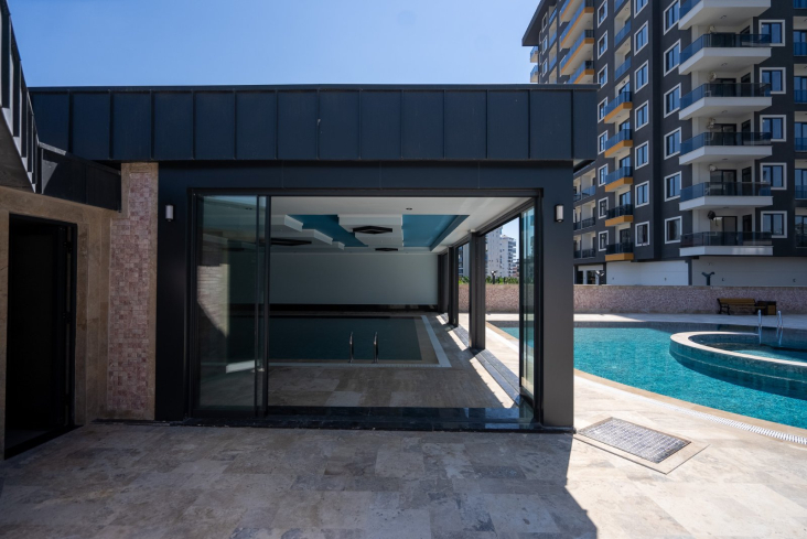 Новая 1+1 в Махмутларе с богатой инфраструктурой и шаговой доступностью к морю