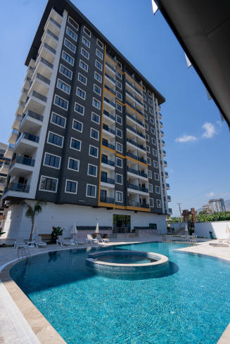 Новая 1+1 в Махмутларе с богатой инфраструктурой и шаговой доступностью к морю