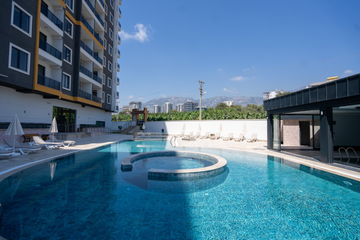 Новая 1+1 в Махмутларе с богатой инфраструктурой и шаговой доступностью к морю