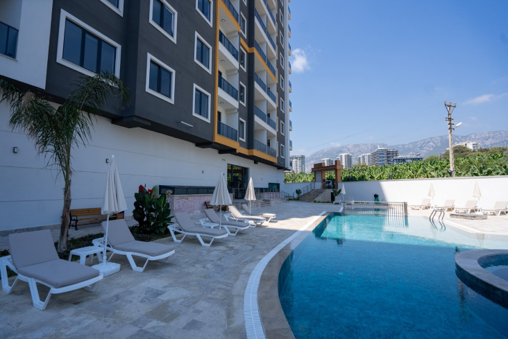 Новая 1+1 в Махмутларе с богатой инфраструктурой и шаговой доступностью к морю