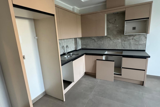 Новая 1+1 в Махмутларе с богатой инфраструктурой и шаговой доступностью к морю