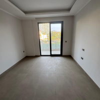 Новая 1+1 в Махмутларе с богатой инфраструктурой и шаговой доступностью к морю