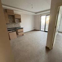 Новая 1+1 в Махмутларе с богатой инфраструктурой и шаговой доступностью к морю