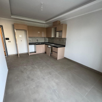 Новая 1+1 в Махмутларе с богатой инфраструктурой и шаговой доступностью к морю