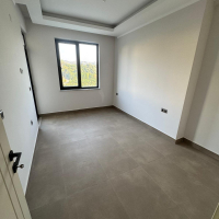 Новая 1+1 в Махмутларе с богатой инфраструктурой и шаговой доступностью к морю