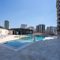 Новая 1+1 в Махмутларе с богатой инфраструктурой и шаговой доступностью к морю