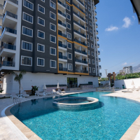 Новая 1+1 в Махмутларе с богатой инфраструктурой и шаговой доступностью к морю