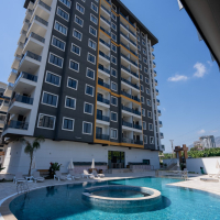 Новая 1+1 в Махмутларе с богатой инфраструктурой и шаговой доступностью к морю