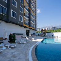 Новая 1+1 в Махмутларе с богатой инфраструктурой и шаговой доступностью к морю