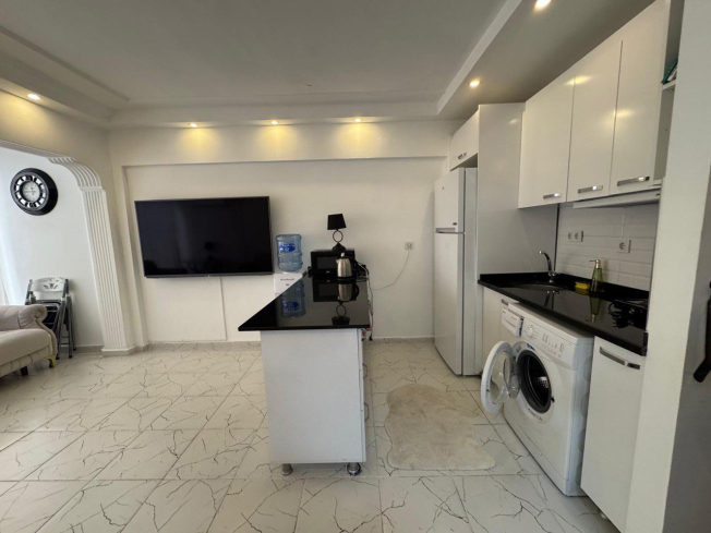 Меблированная 1+1 в Махмутларе с бассейном — 300 м до моря