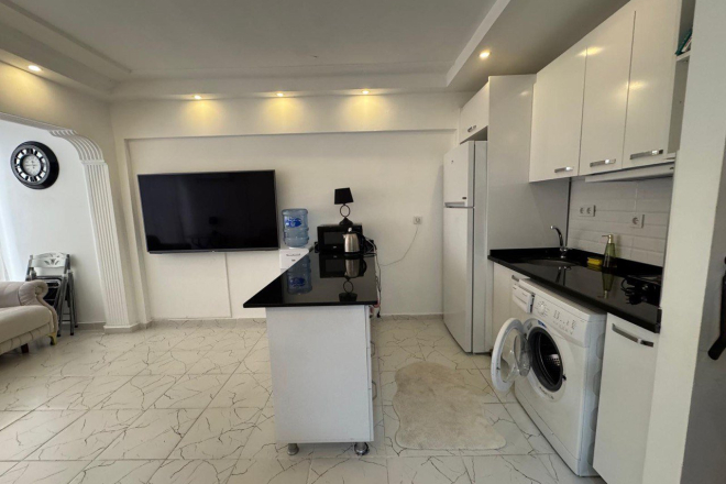 Меблированная 1+1 в Махмутларе с бассейном — 300 м до моря