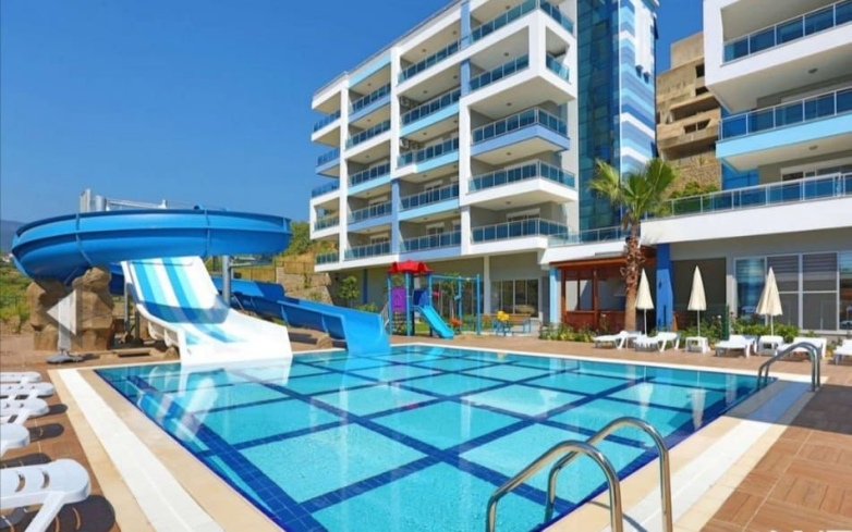 FULL AKTİVİTELİ SİTEDE GENİŞ 1+1 SATILIK EŞYALI  DAİRE