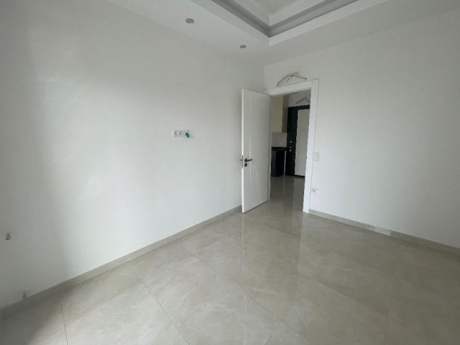 Современная 1+1 в Махмутларе с отельной инфраструктурой и потенциалом аренды