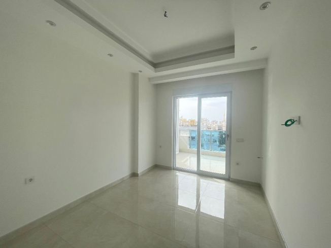 Современная 1+1 в Махмутларе с отельной инфраструктурой и потенциалом аренды