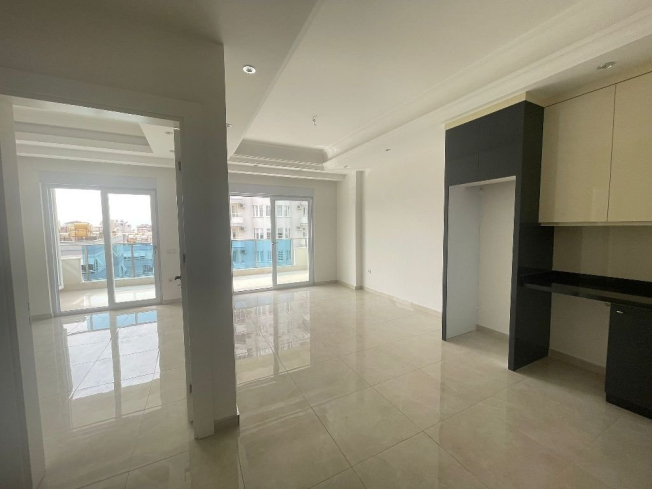 Современная 1+1 в Махмутларе с отельной инфраструктурой и потенциалом аренды