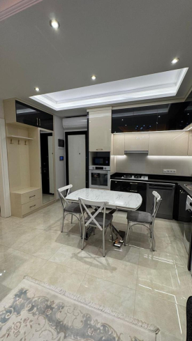 Современная 1+1 с отельной инфраструктурой и высоким арендным потенциалом в Махмутларе