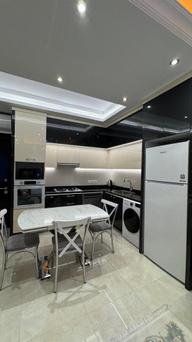 Современная 1+1 с отельной инфраструктурой и высоким арендным потенциалом в Махмутларе