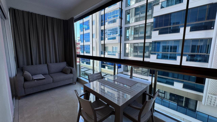 Современная 1+1 с отельной инфраструктурой и высоким арендным потенциалом в Махмутларе