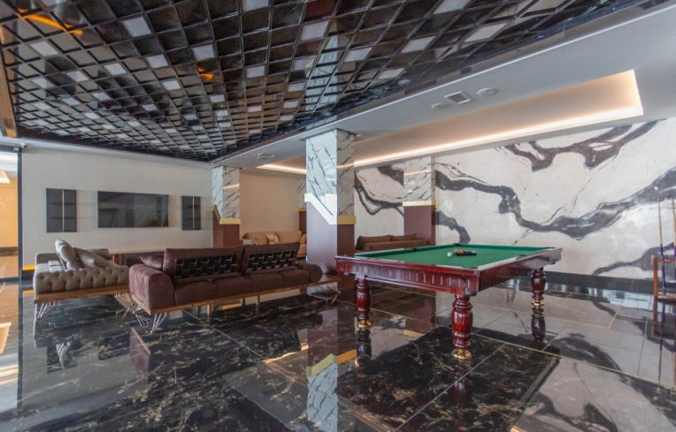 Современная 1+1 с отельной инфраструктурой и высоким арендным потенциалом в Махмутларе