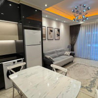 Современная 1+1 с отельной инфраструктурой и высоким арендным потенциалом в Махмутларе