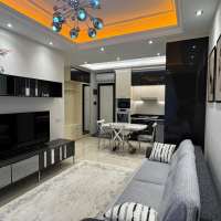 Современная 1+1 с отельной инфраструктурой и высоким арендным потенциалом в Махмутларе