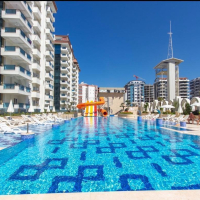 Современная 1+1 с отельной инфраструктурой и высоким арендным потенциалом в Махмутларе