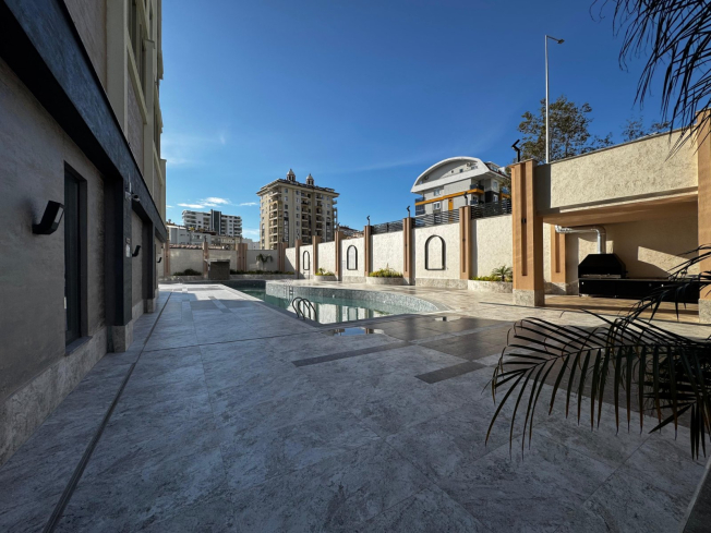 Просторная 2+1 в новом доме в Махмутларе — идеальна для жизни и аренды