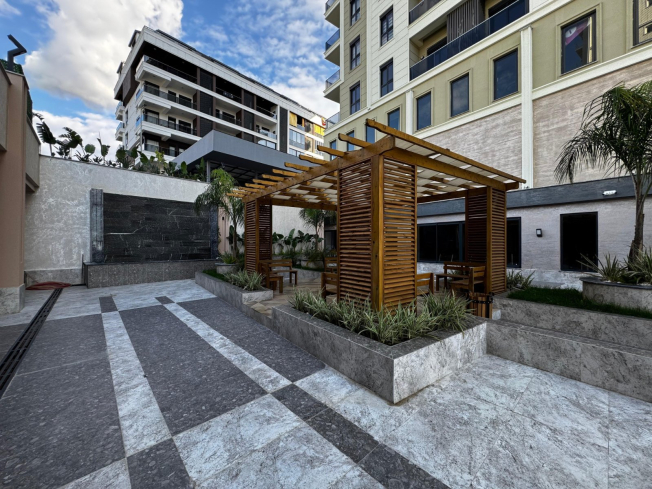 Просторная 2+1 в новом доме в Махмутларе — идеальна для жизни и аренды