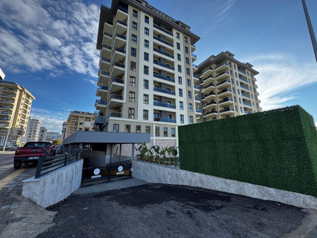 Просторная 2+1 в новом доме в Махмутларе — идеальна для жизни и аренды