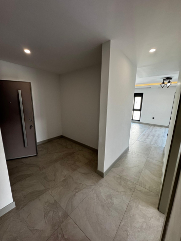 Просторная 2+1 в новом доме в Махмутларе — идеальна для жизни и аренды