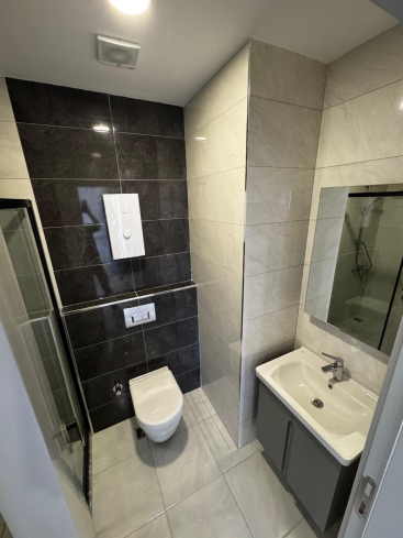 Просторная 2+1 в новом доме в Махмутларе — идеальна для жизни и аренды