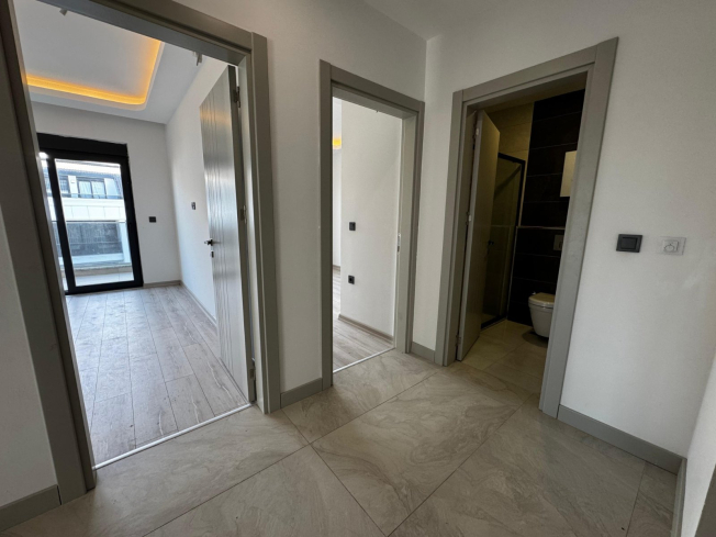 Просторная 2+1 в новом доме в Махмутларе — идеальна для жизни и аренды