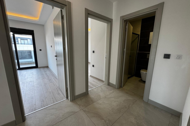 Просторная 2+1 в новом доме в Махмутларе — идеальна для жизни и аренды